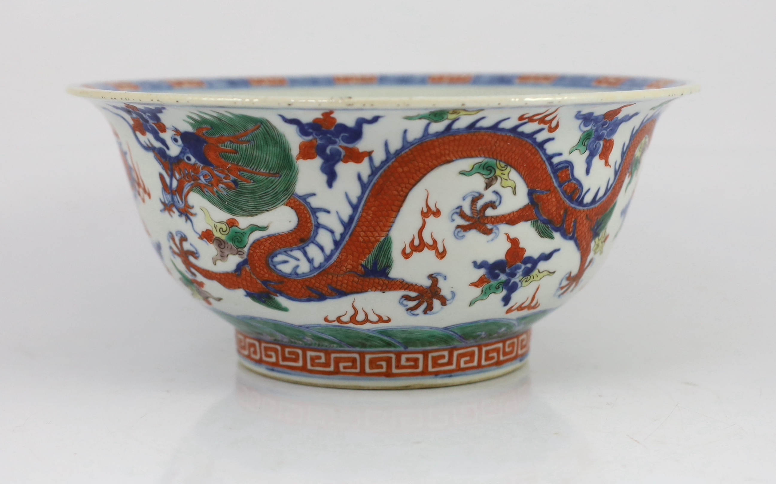A Chinese doucai 'dragon' deep bowl, 19th century, small chip and glaze losses to rim